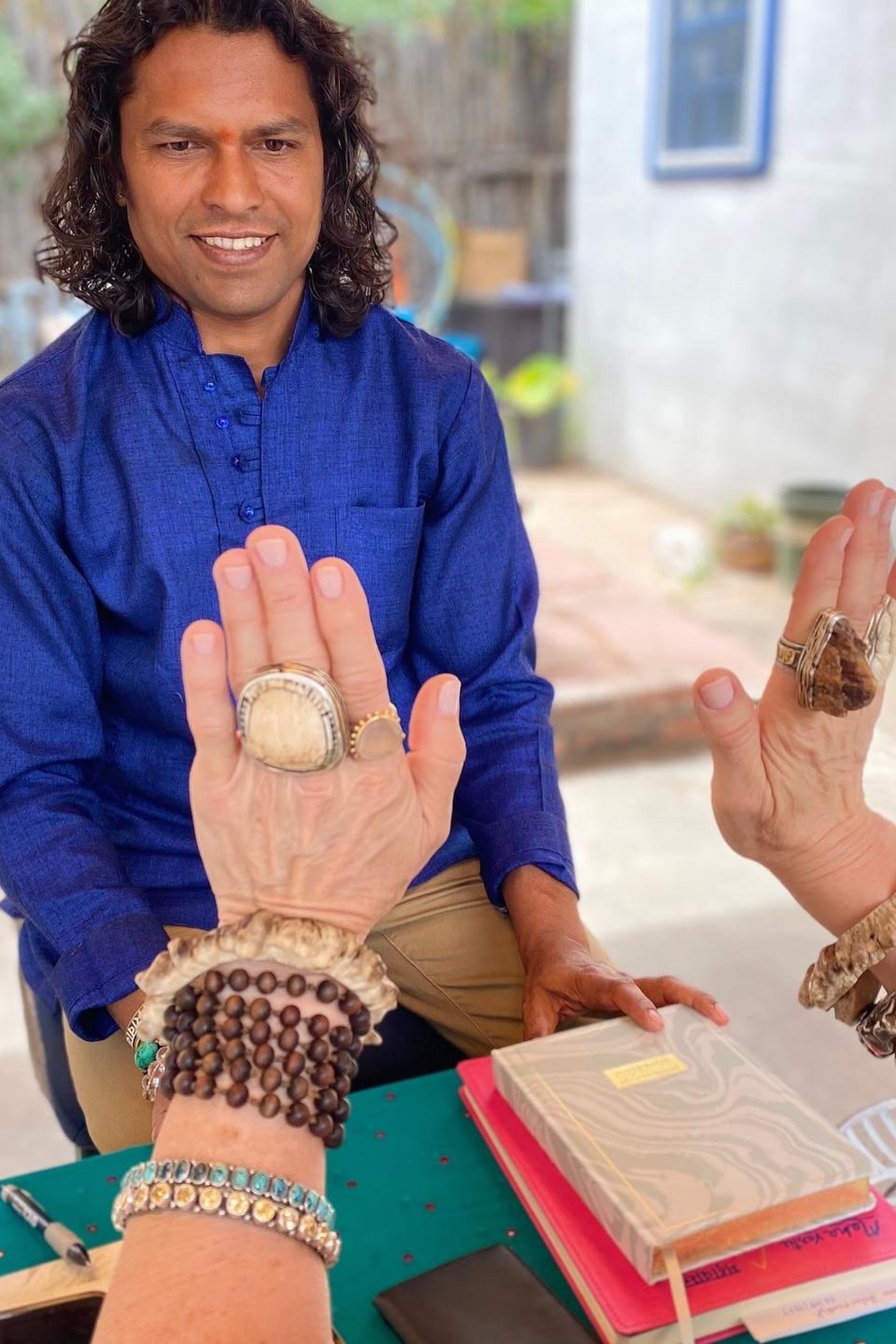 How to choose between a palm reading, Vedic astrology session, or Vastu consultation in Sedona, highlighting the benefits and insights of each spiritual service.